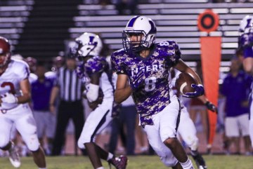 Joseph Homan scored a touchdown in the first quarter to take a short-lived 7-0 lead for the Tigers.